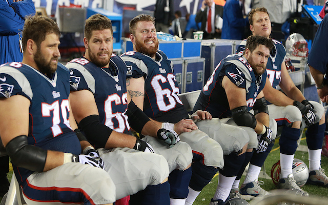 New England's offensive line has its hands full this week. (Getty Images)