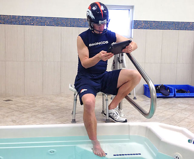 peyton-manning-helmet-ipad-pool.jpg