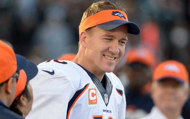 Peyton Manning will see a big reduction in his per-game pay in the playoffs. (USATSI)