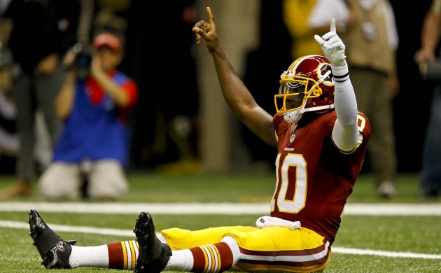 Washington Redskins quarterback Robert Griffin III (10) looks to pass  during second quarter action against the