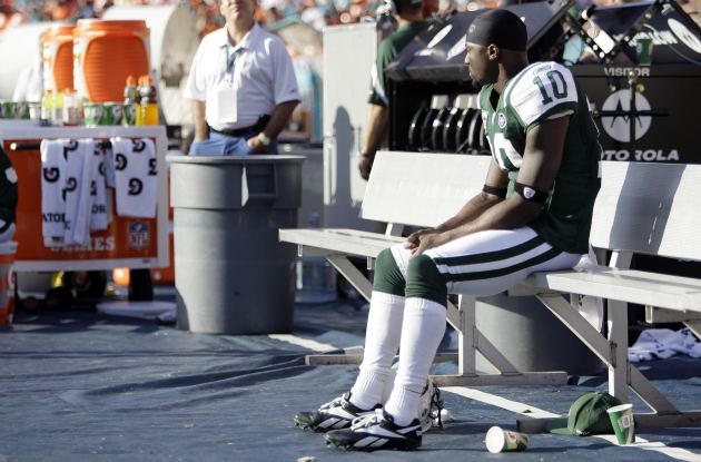 For now, all Santonio Holmes can do is sit on the bench. (USATSI)