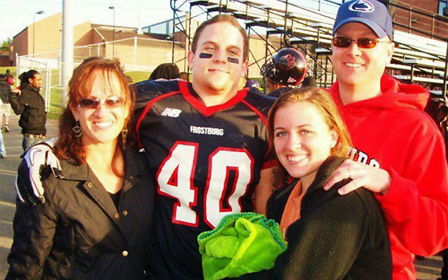 Derek Sheely and his sister, Keyton, are flanked here by their parents. (Sheely family)