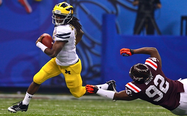 Denard Robinson says he can take Usain Bolt in a 40-yard dash. How