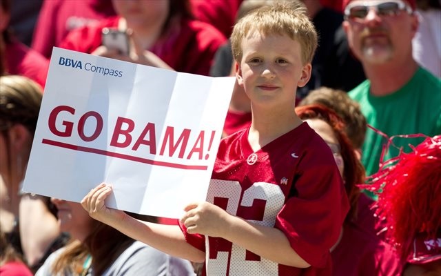 Alabama fans (like this one at the Tide spring game) aren't shy about loving their team. (USATSI)