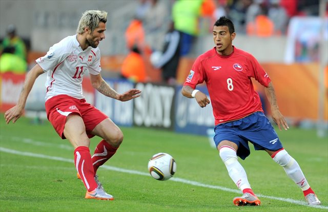 Arturo Vidal (right, at the 2010 World Cup) faces fitness questions for Chile. (USATSI)