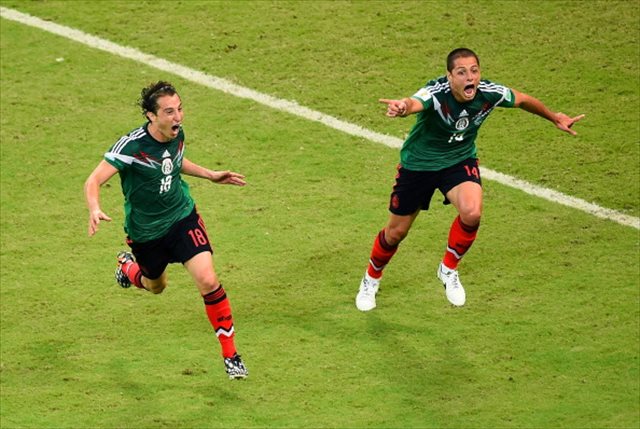 Chicharito Hernandez (right) was the driving force behind Mexico's 3-1 victory. (USATSI)