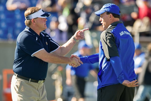 Brian Kelly (with Air Force coach Troy Calhoun last year) is not a fan of playing the academies. (USATSI)