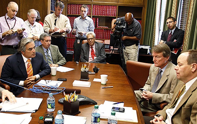 Thanks to realignment, even administrators like Texas president Bill Powers (second from right) were rock stars for a while. (AP)