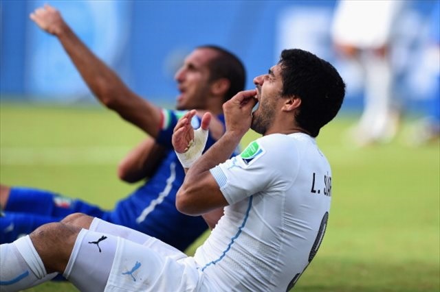 Luis Suarez's apparent bad behavior has once again rocked the World Cup. (Getty Images)