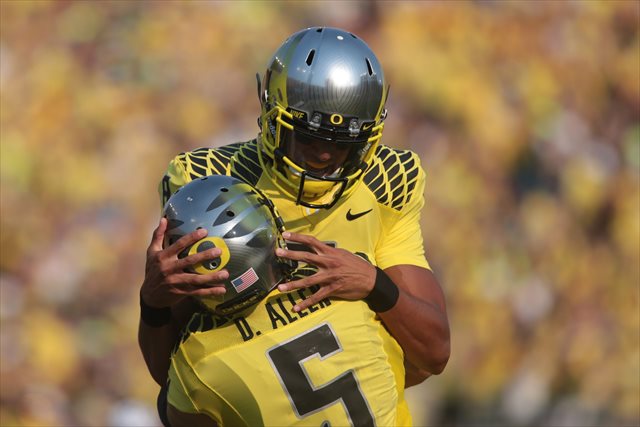 Marcus Mariota and Oregon received six first-place votes in the Coaches Poll. (USATSI)