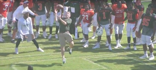 Tom Symonds, making an extremely important punt catch. (@MiamiHurricanes)