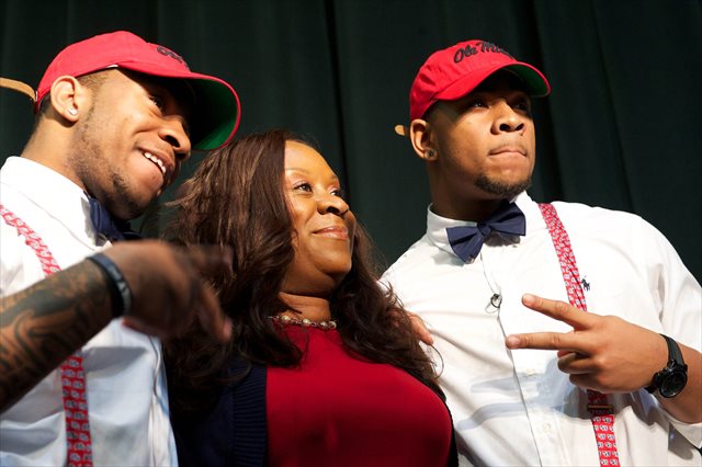 Denzel (left) and Robert Nkemdiche celebrate with their mother, Beverly, on Signing Day 2013. (USATSI)