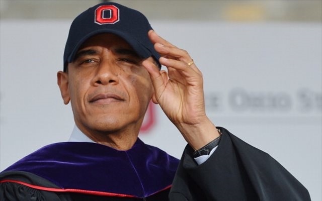 Barack Obama wears an Ohio State hat after his speech to OSU's new graduates. (Getty Images)