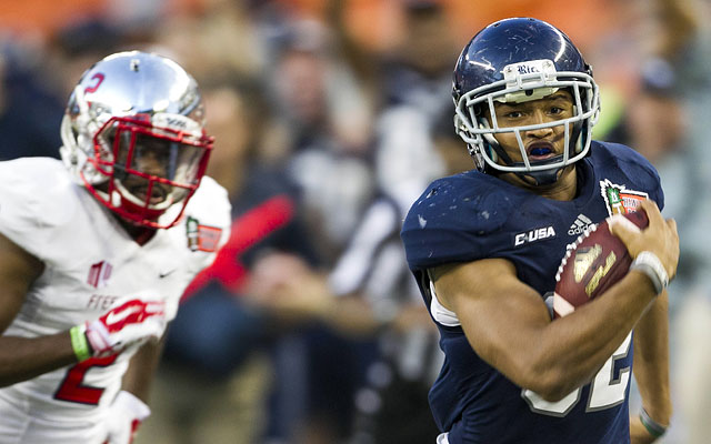 Rice's Darik Dillard races away from  Jamal Ellis in the Hawaii Bowl. (USATSI)