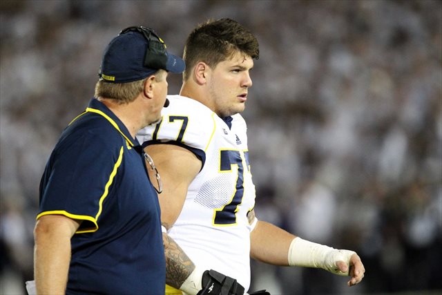 Michigan's Taylor Lewan apologizes for facemask twist against Spartans 