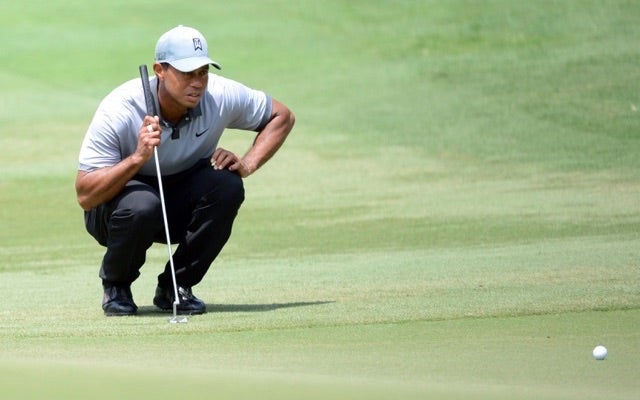 Tiger Woods is just out here helping everyone. (USATSI)