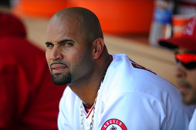 Albert Pujols yanks out Bartolo Colon's jersey 