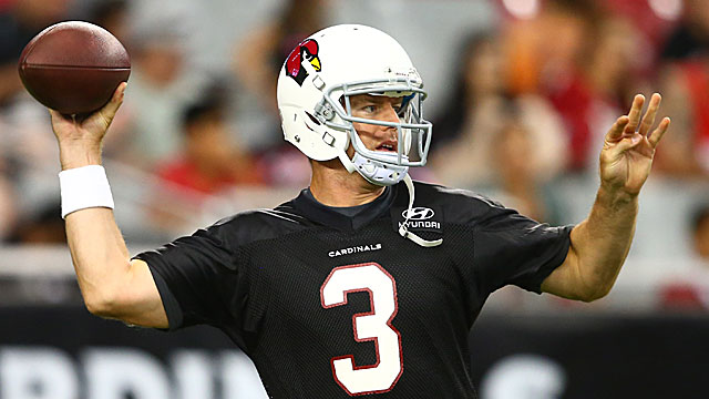 Newly acquired quarterback Carson Palmer tosses the ball during drills. (USATSI)