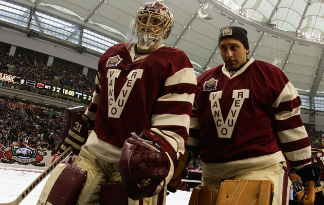 Roberto Luongo and Eddie Lack in the Heritage Classic jerseys. (Getty Images)