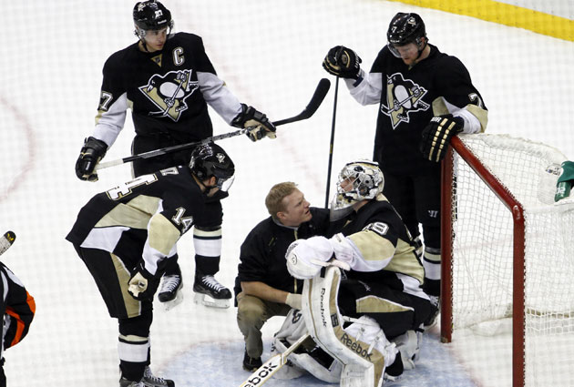 Pittsburgh Penguin goalie Marc-Andre Fleury blocks a shot in the