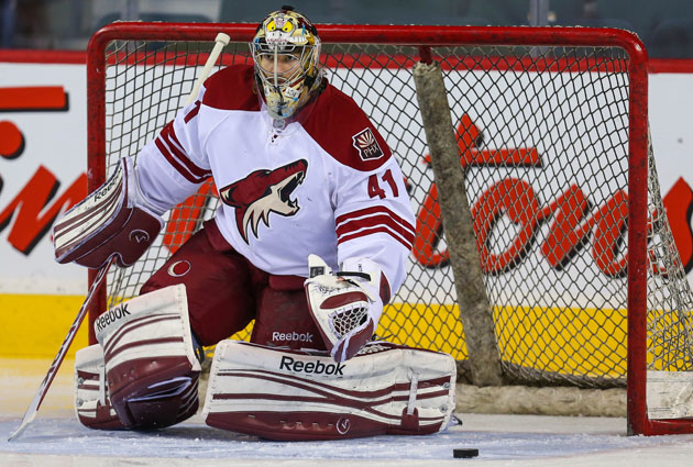 Arizona Coyotes goalie Mike Smith defends the goal during the