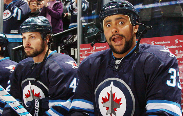 Bogosian's and Byfuglien's slow starts haven't brought Big Buff down. (Getty Images)