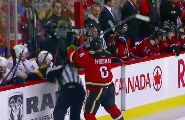 Dennis Wideman put linesman Don Henderson on the ice with this shove. (Sportsnet)