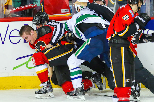 Kevin Bieksa's pounding of Michael Ferland offers small consolation in  Canucks loss to the Flames