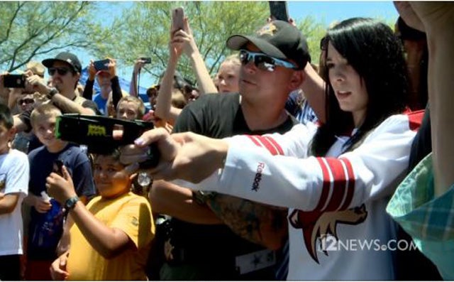 This Coyotes fan got to legally taser the mayor of Glendale. (12News)