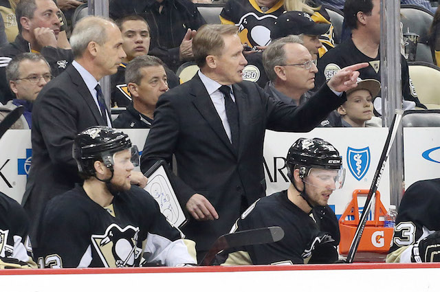 The Penguins' president says coach Mike Johnston will return next season. (USATSI)