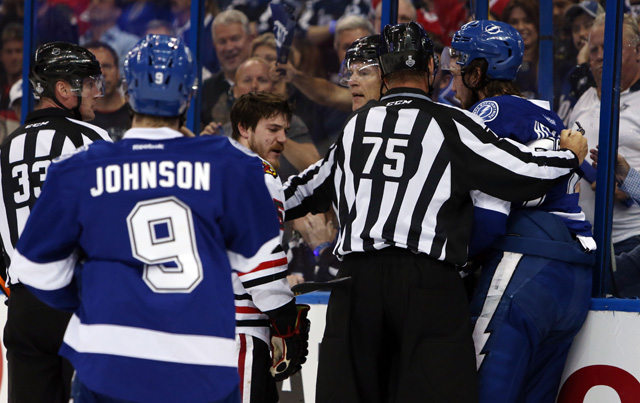 We're still wondering if Andrew Shaw bit Victor Hedman during this scrum. (USATSI)