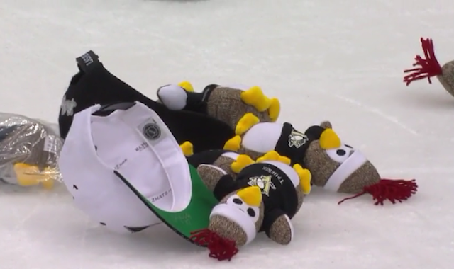 Penguins fans celebrate hat trick 