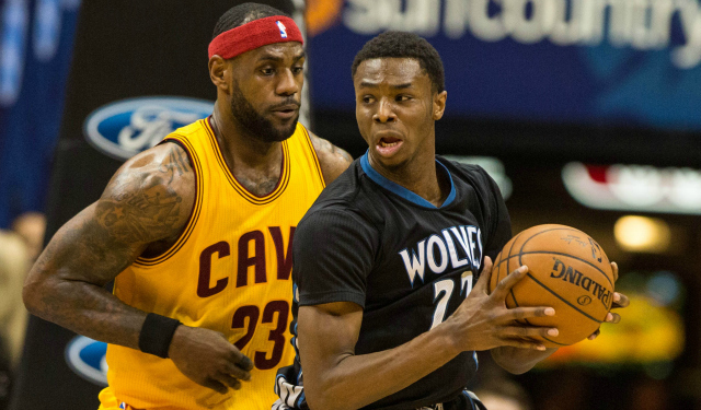 Andrew Wiggins makes a move against LeBron James.  (USATSI)