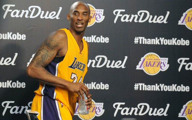 Kobe Bryant leaves the last press conference of his career.  (USATSI)