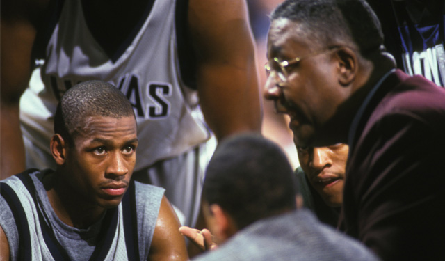 allen iverson wearing his new jersey over his draft day suit will always be  iconic.