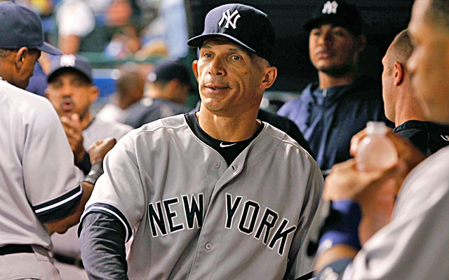 New York Yankees manager Joe Girardi (28) watches as his team does