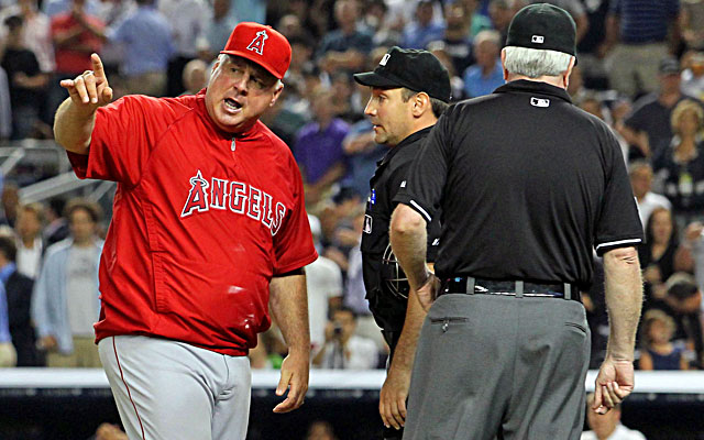 Mike Scioscia and the Angels missed the playoffs in 2012 and finished below .500 this season. (USATSI)