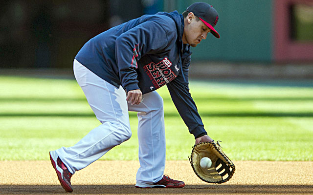 Allen Craig, taking ground balls at first base, is likely only available to pinch hit in Game 3. (USATSI)