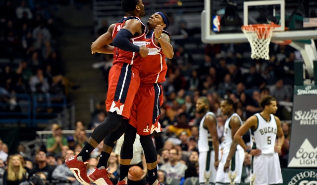 Bradley Beal celebrates with his backcourt buddy.  (USATSI)