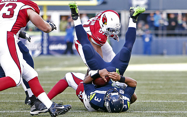 Seahawks QB Russell Wilson was sacked seven times by the Cardinals. (USATSI)
