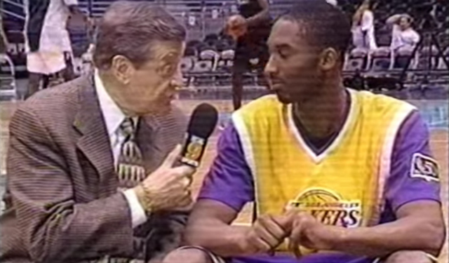 Chick Hearn interviews a young Laker.  (USATSI)