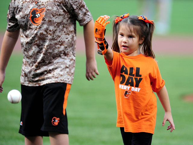 With help from prosthetic hand, Hailey Dawson continues first-pitch tour