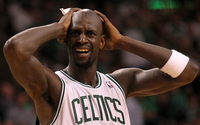 Miami Heat's LeBron James (6) and Boston Celtics' Kevin Garnett (5