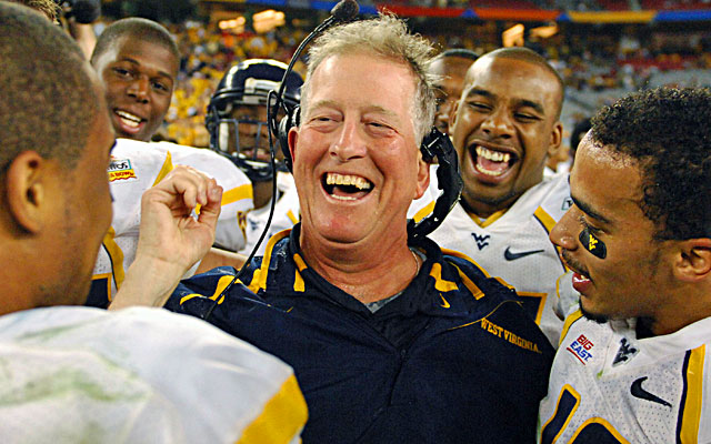 Bill Stewart (center), who died in 2012, guided WVU to a 48-28 win over Oklahoma in the 2008 Fiesta Bowl. (USATSI)