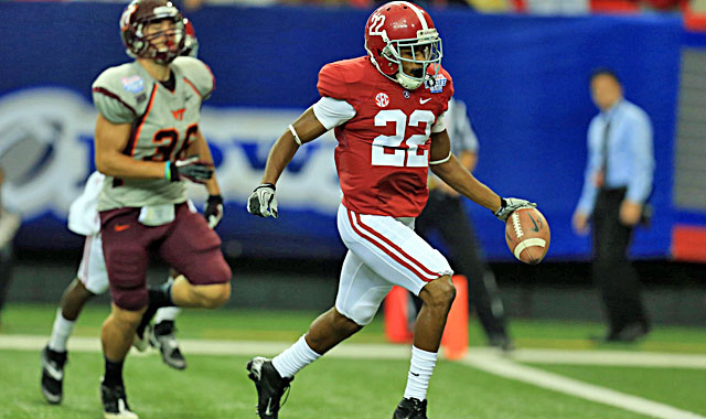 Christion Jones scores on a punt return (above), returns a kickoff for a TD and makes Alabama history. (USATSI)