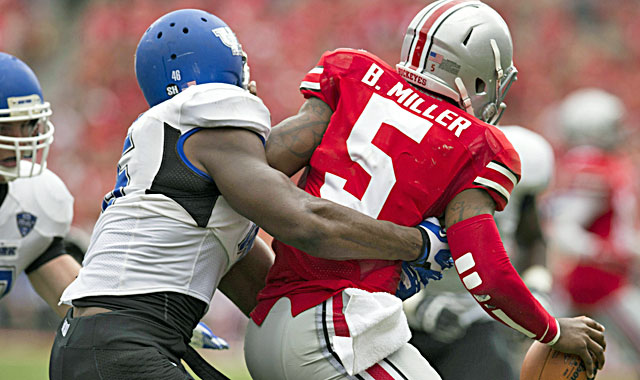 Khalil Mack terrorizes Ohio State, compiling 9 1/2 tackles, 2 1/2 sacks, an interception (returned for a TD). (USATSI)