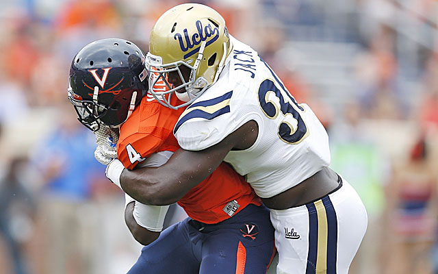 Myles Jack and the Bruins defense scored three times in a tight win over Virginia. (Getty)