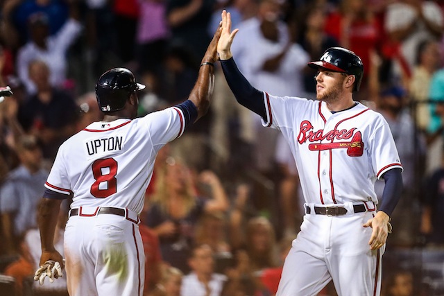 B. J. Upton and Chris Johnson of the Atlanta Braves celebrate after News  Photo - Getty Images