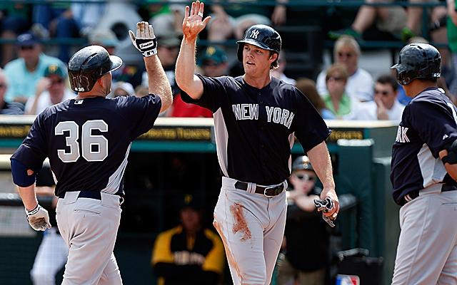 Brennan Boesch (center), who made his Yankees debut last week, has a 'stiff ribcage.' (Getty Images)