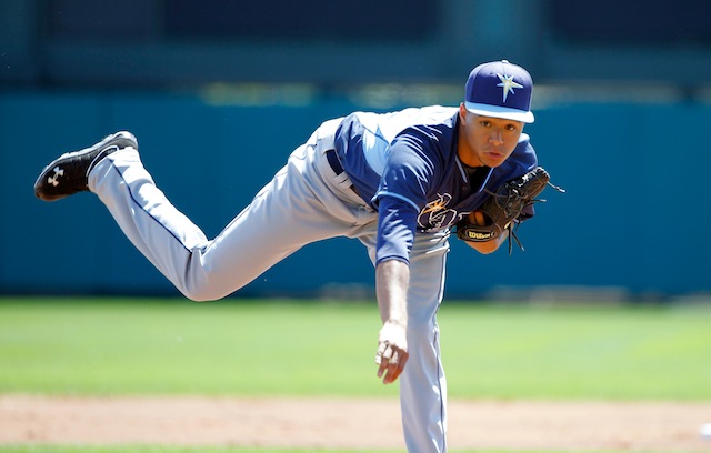 An American professional baseball player, Chris Archer holds a net